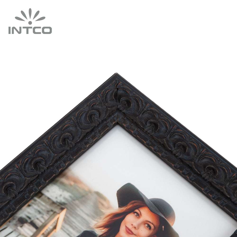 Custom black oranate picture frame moldings